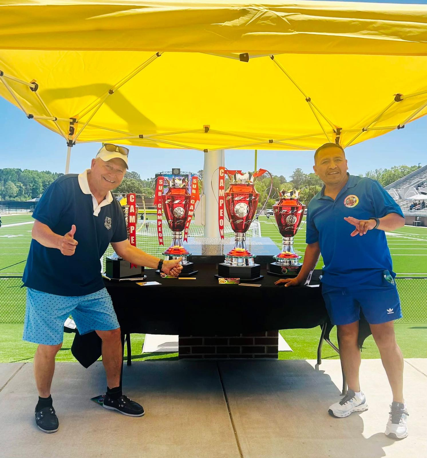 CISL Campeón and Sub-Campeón trophies on display at Odis Spencer Stadium